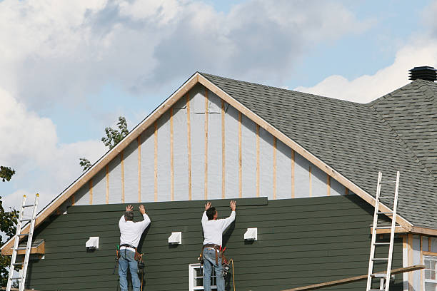 Professional Siding technician working in Marion, CT